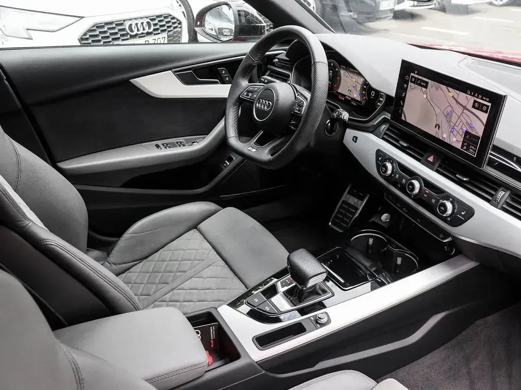 Gebraucht Audi A4 S-Line 204 PS (150 kW) 2023 Tangorot metallic Kombi