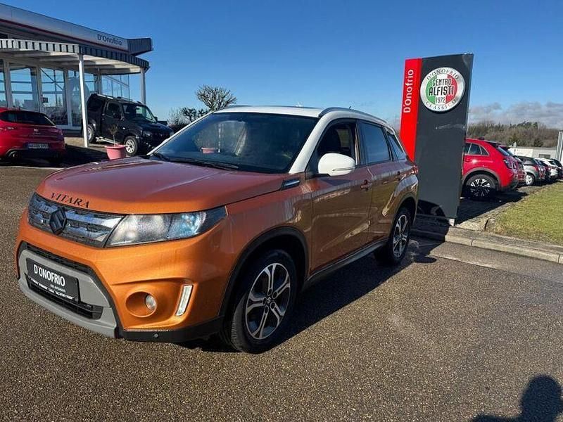 Gebraucht Suzuki Vitara Comfort+ 120 PS (88 kW) 2016 Horizon orange metallic/superi SUV