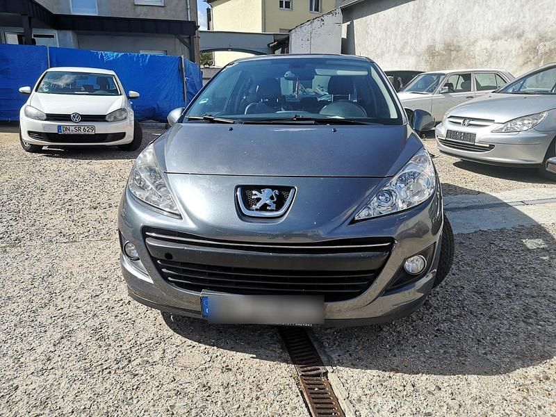 Grau Gebraucht 2011 Peugeot 207 Kleinwagen | 2.300 € - Bild 1/4