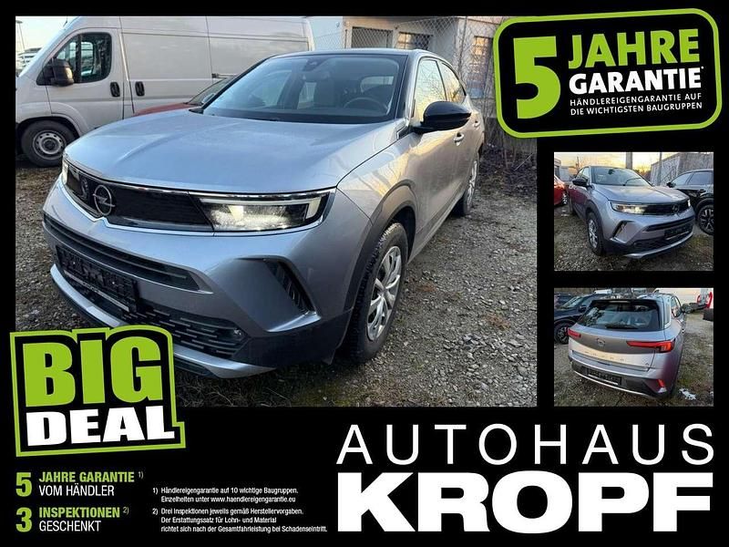 Kontrast grau/quarz silber Gebraucht 2021 Opel Mokka-e Elegance SUV | 15.980 € (Fairer Preis) - Bild 1/4