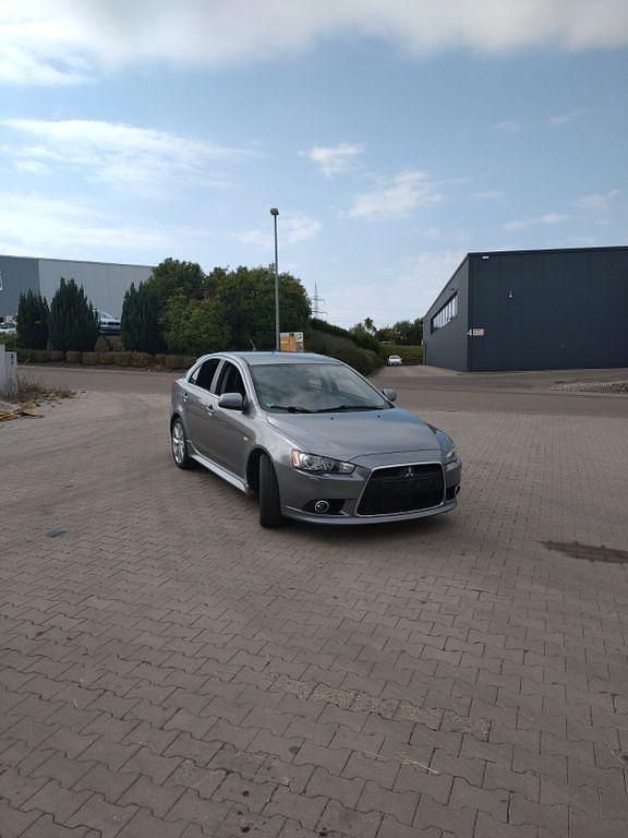 Grau Gebraucht 2014 Mitsubishi Lancer Top Limousine | 6.590 € (Guter Preis) - Bild 1/4