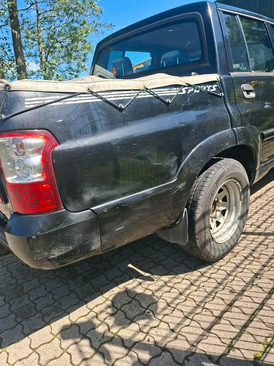 Gebraucht SsangYong Musso 119 PS (87 kW) 2006 Schwarz Limousine