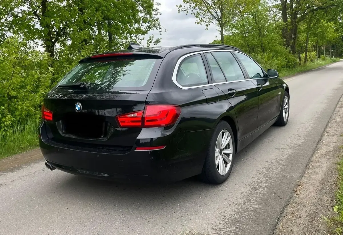 Gebraucht BMW 520 184 PS (135 kW) 2011 Schwarz Kombi