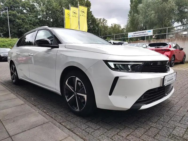 Gebraucht Opel Astra Elegance 110 PS (80 kW) 2024 Lack weiss banquise/typ aussenverkleidung spiegel flach standard Kombi