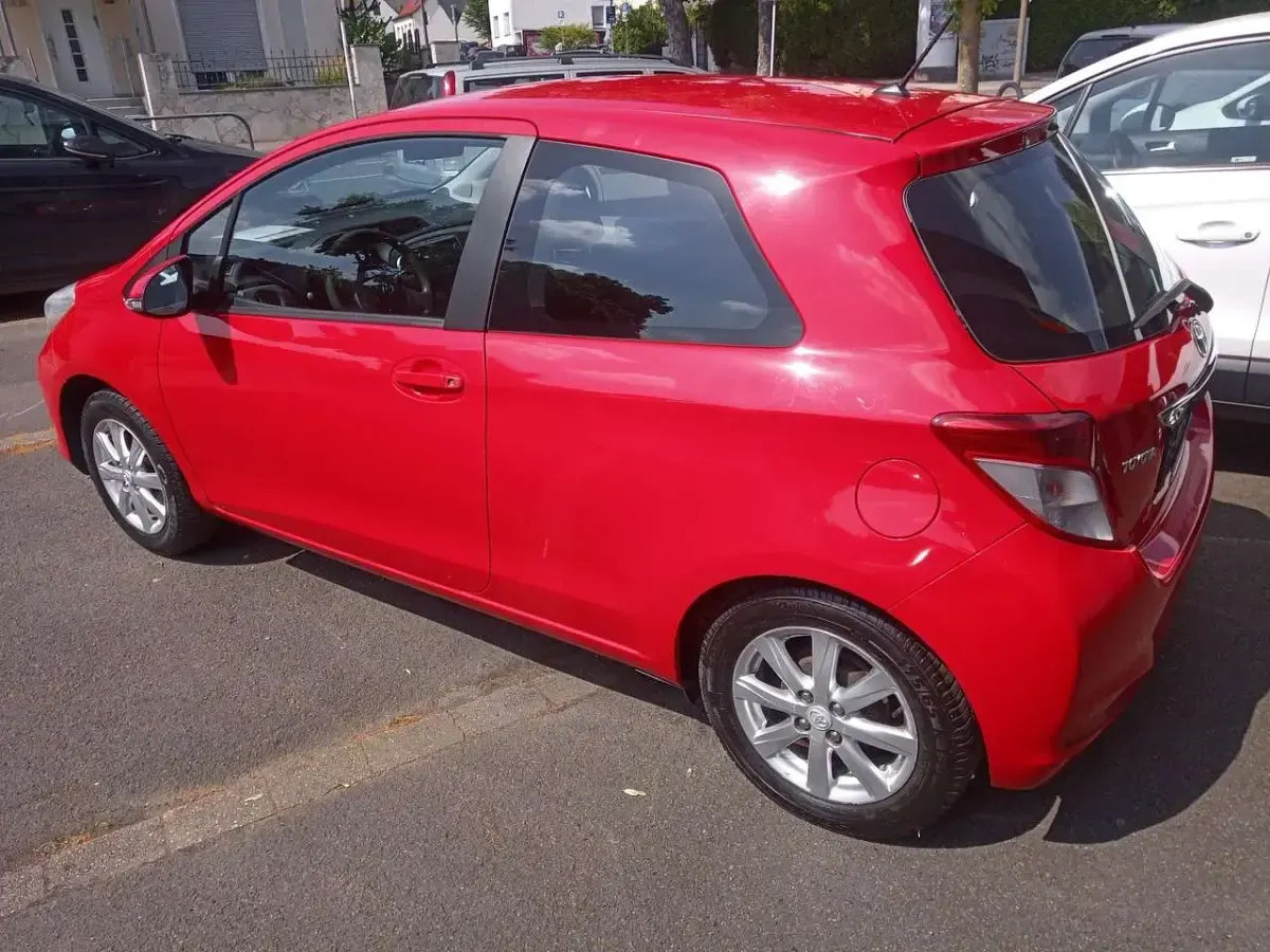 Gebraucht Toyota Yaris Cool 99 PS (72 kW) 2012 Super red 5 Kleinwagen