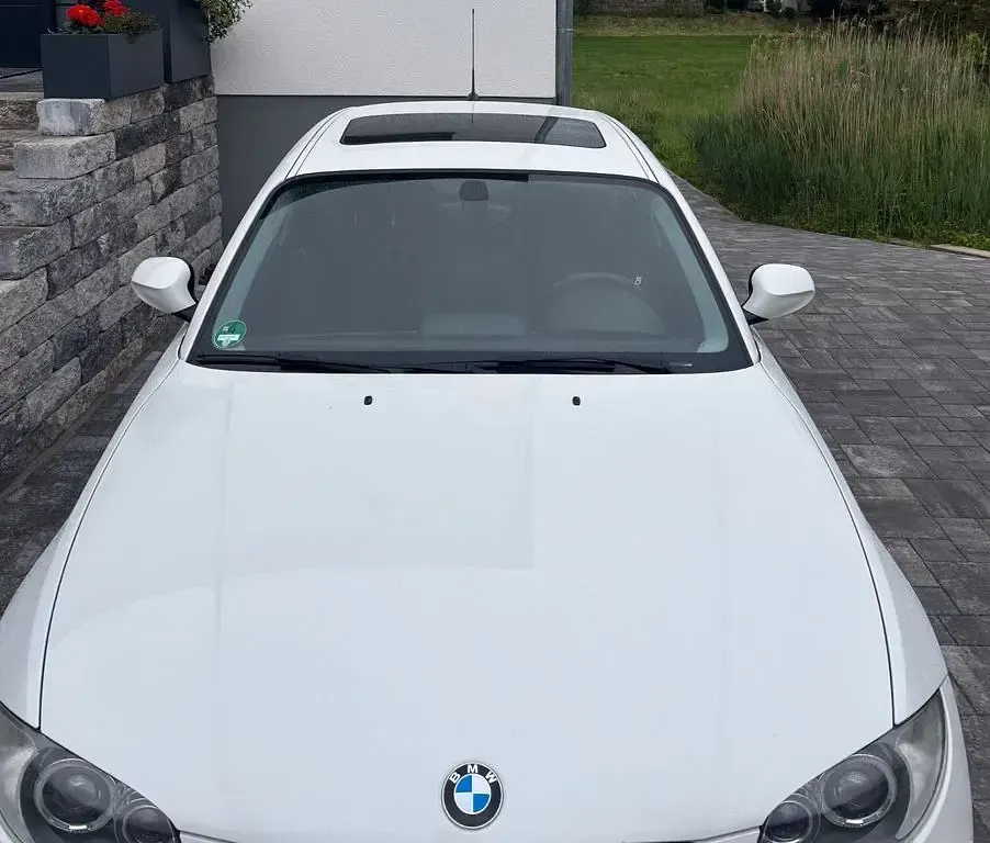 Używany BMW 116 122 KM (89 kW) 2011 Biały Hatchback