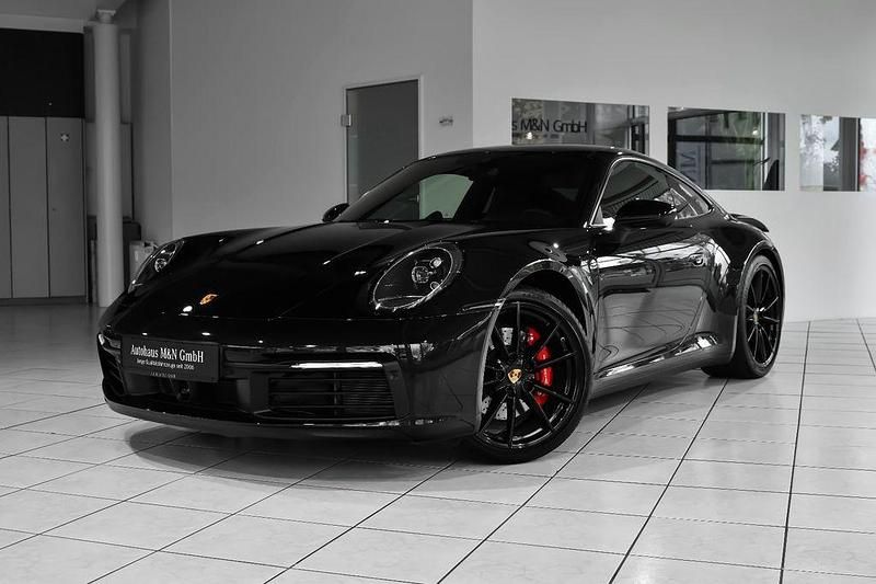 Tiefschwarz Gebraucht 2019 Porsche 911 Carrera 4S Coupé | 129.900 € (Teuer) - Bild 1/4
