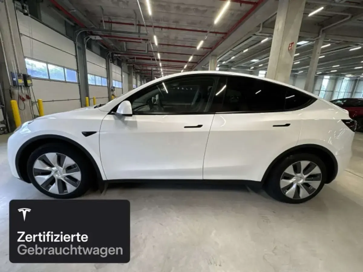 Gebraucht Tesla Model Y Long Range AWD 258 kW (351 PS) 2023 Pearl white multicoat SUV