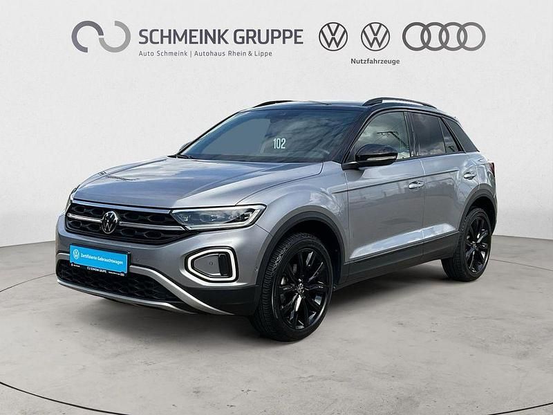 Pyritsilber metallic Gebraucht 2024 VW T-Roc Style SUV | 28.880 € (Fairer Preis) - Bild 1/4