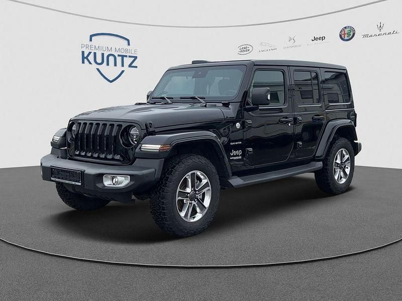 Black clear coat Gebraucht 2021 Jeep Wrangler Unlimited Sahara SUV | 47.357 € (Etwas zu teuer) - Bild 1/4