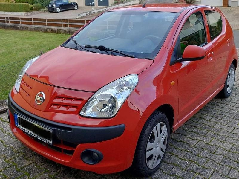 Gebraucht Nissan Pixo Acenta 68 PS (50 kW) 2010 Rot Kleinwagen