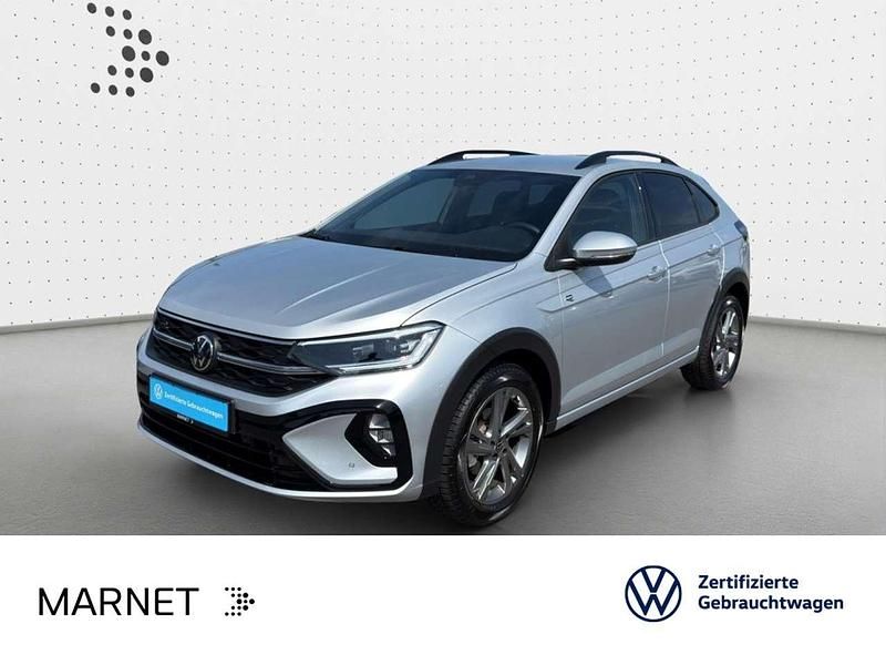 Reflexsilber metallic Gebraucht 2024 VW Taigo R-line SUV | 27.990 € (Fairer Preis) - Bild 1/3