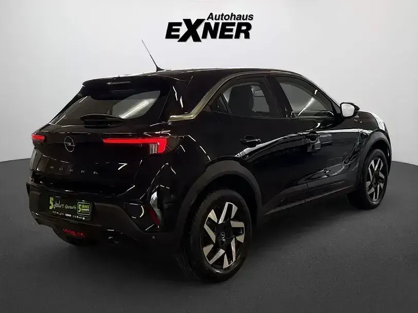 Gebraucht Opel Mokka Elegance 101 PS (74 kW) 2024 Perla nera schwarz SUV