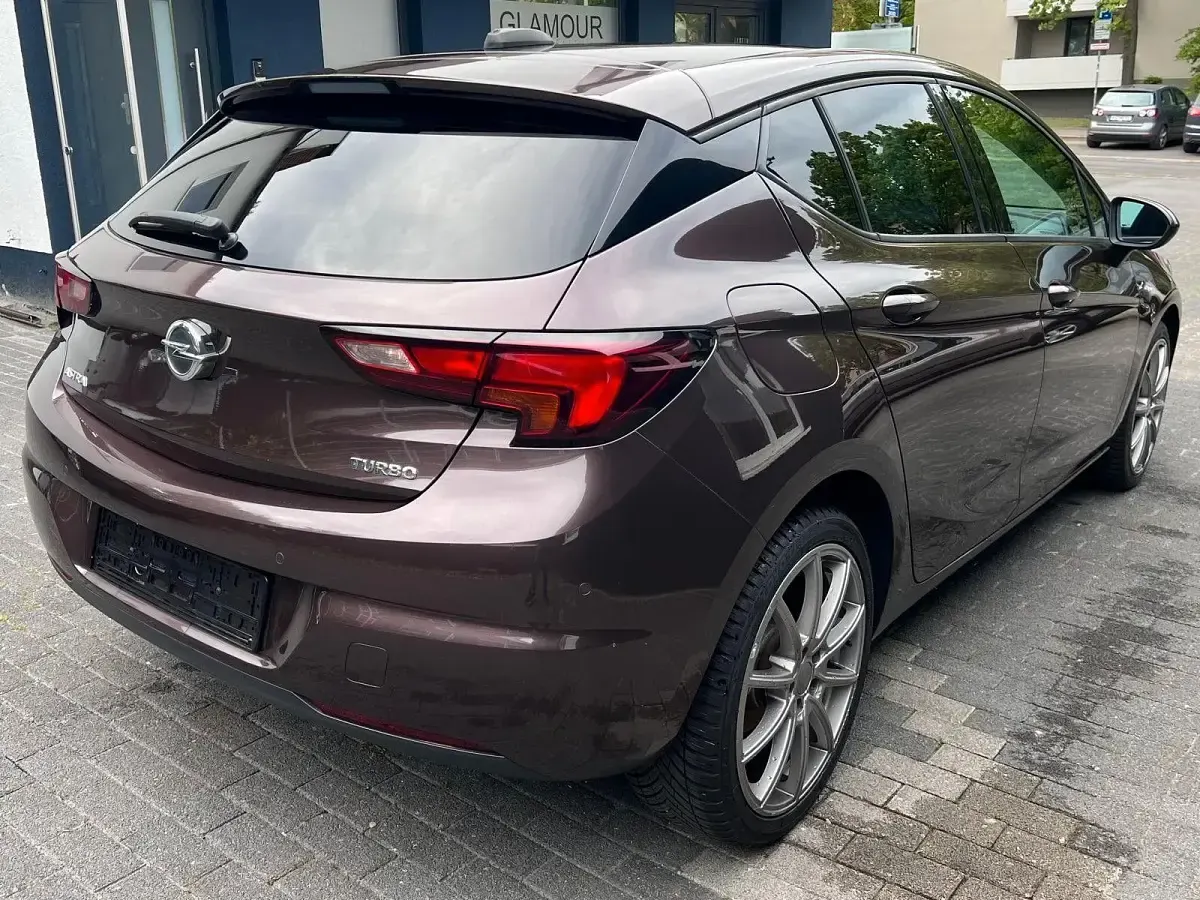 Gebraucht Opel Astra Active 125 PS (91 kW) 2017 Braun Limousine