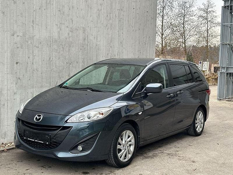 Grau Gebraucht 2011 Mazda 5 Center-Line Van / Kleinbus | 8.990 € (Fairer Preis) - Bild 1/4