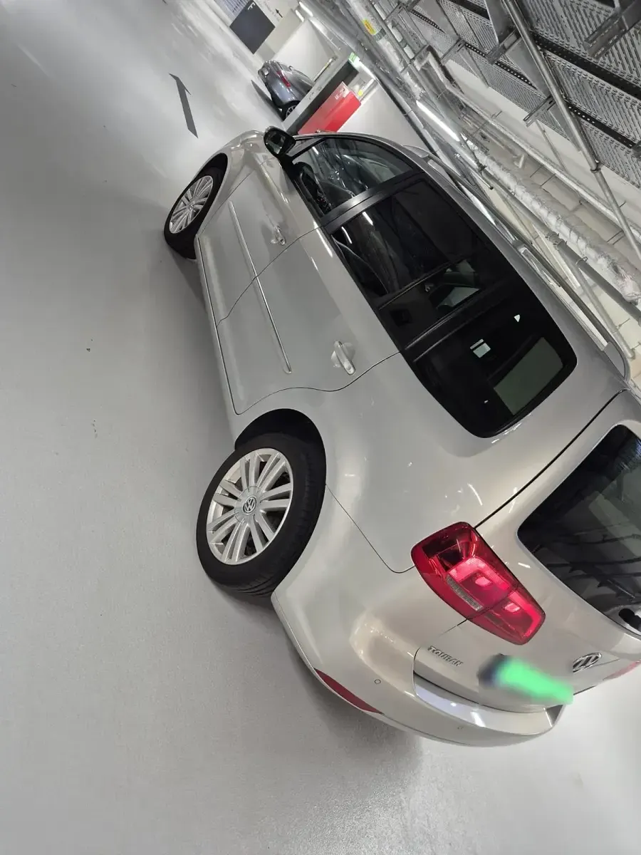 Gebraucht VW Touran Highline 140 PS (102 kW) 2012 Grau Van / Kleinbus