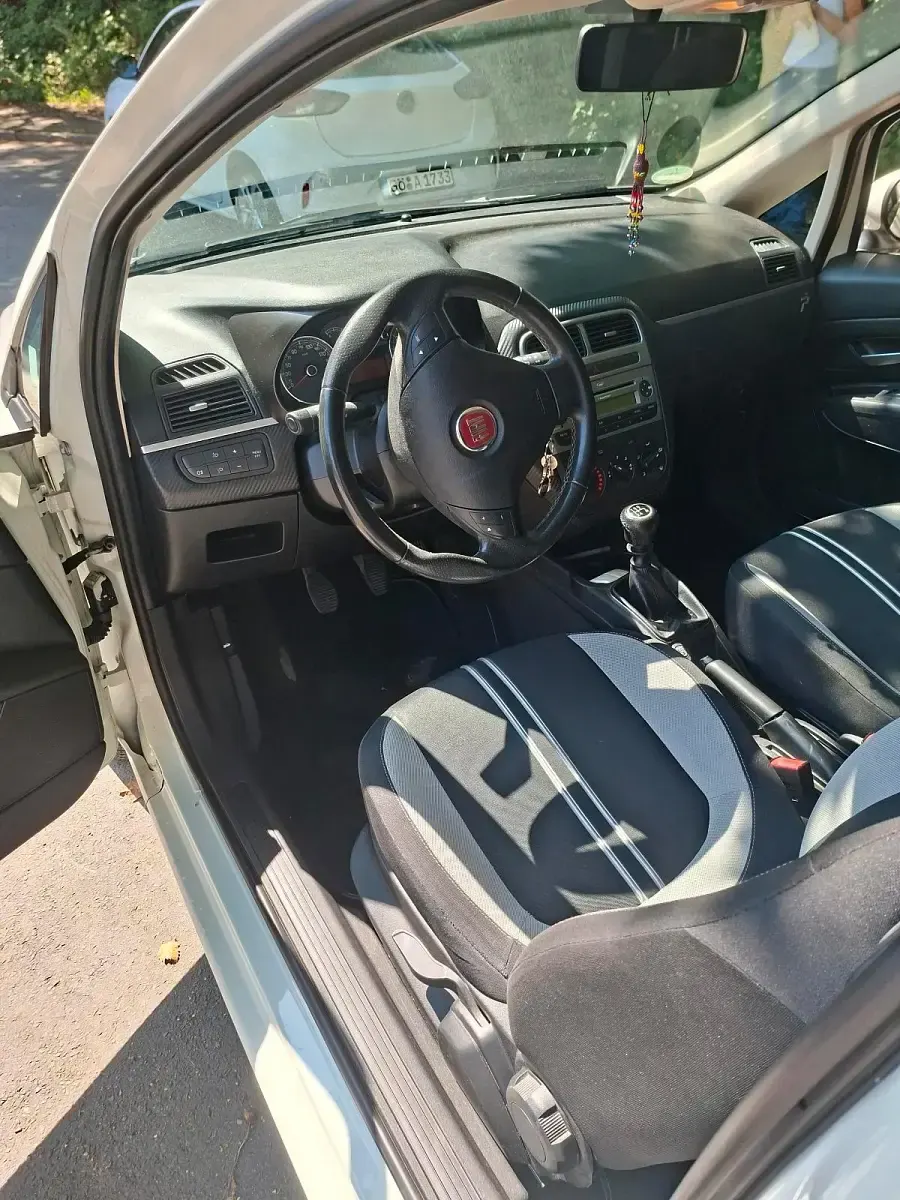 Gebraucht Fiat Punto Evo 77 PS (56 kW) 2009 Weiß Kleinwagen