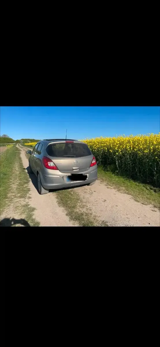 Gebraucht Opel Corsa 101 PS (74 kW) 2014 Gold Kleinwagen