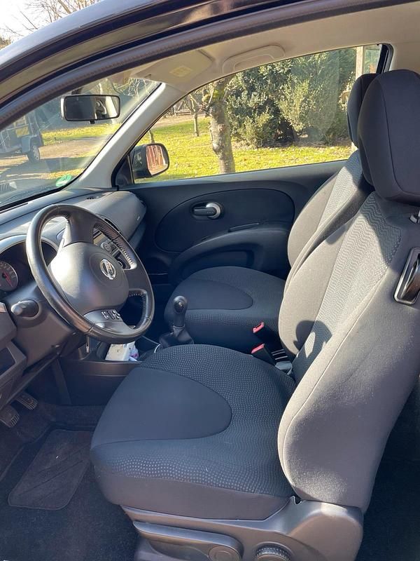 Gebraucht Nissan Micra 65 PS (47 kW) 2010 Schwarz Kleinwagen