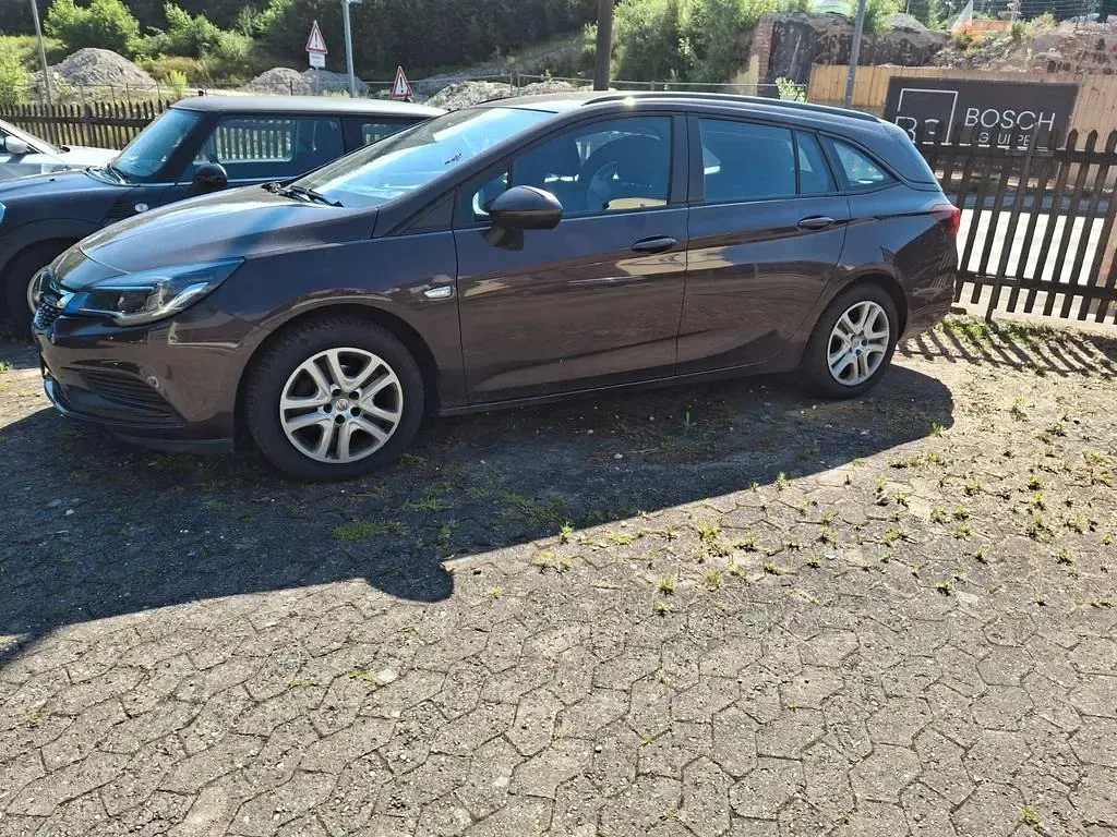 Gebraucht Opel Astra Edition 110 PS (80 kW) 2018 Braun Kombi