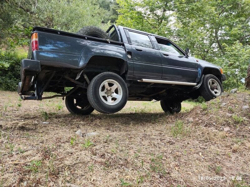 Grau Gebraucht 1988 Toyota HiLux Abholung | 13.000 € - Bild 1/4