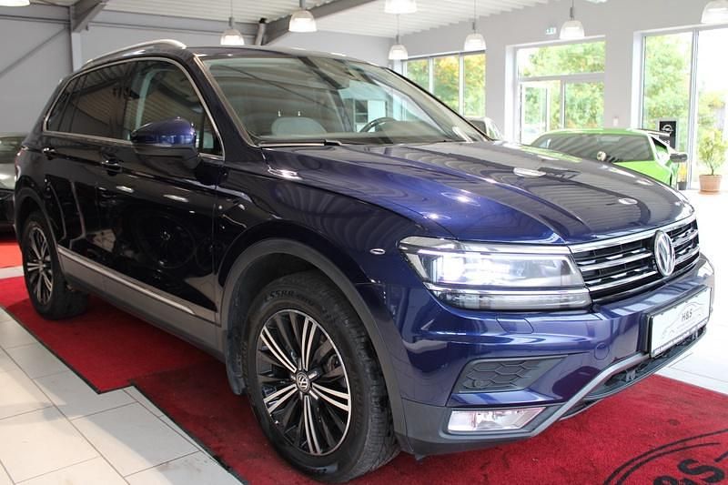 Atlantic blue Gebraucht 2015 VW Tiguan Highline SUV | 20.900 € - Bild 1/4