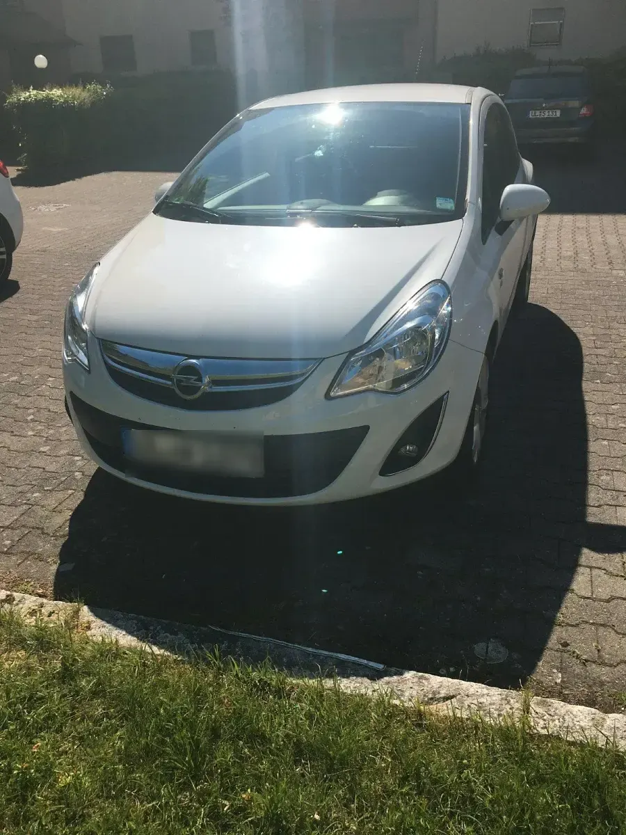 Używany Opel Corsa 69 KM (50 kW) 2012 Biały Hatchback