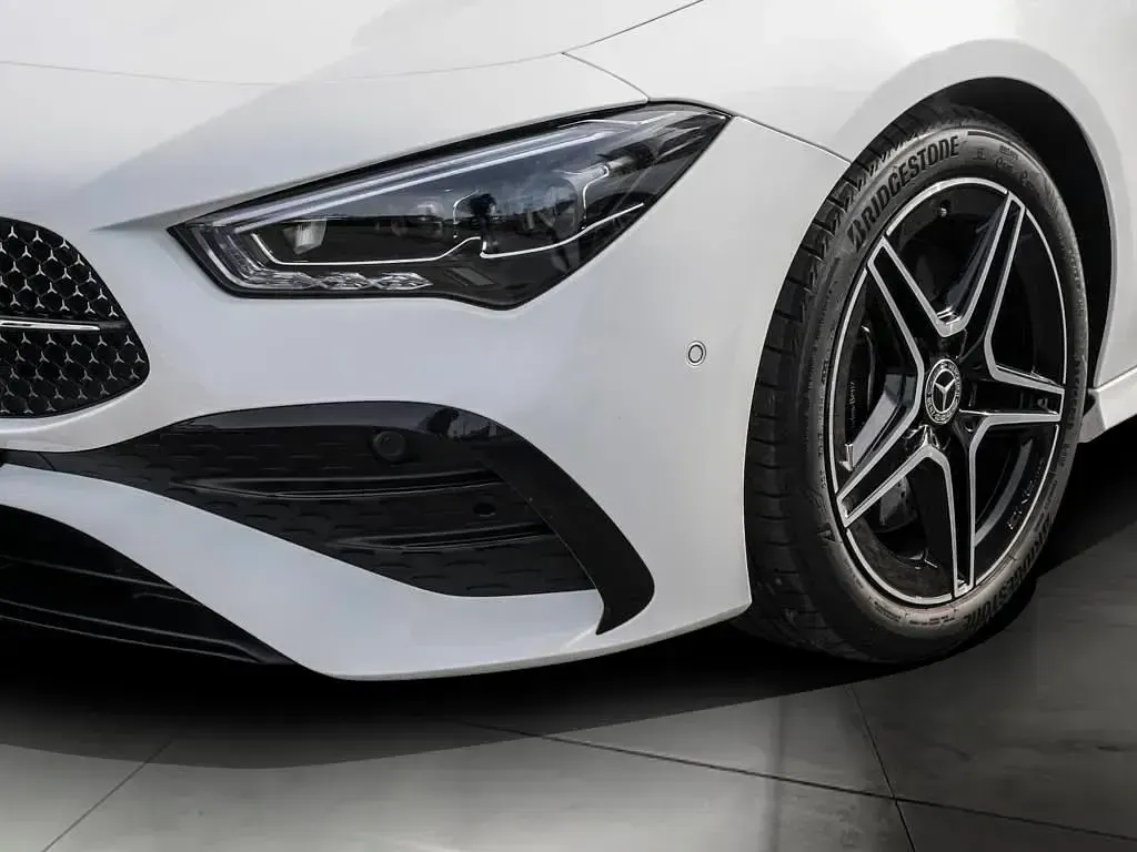 Gebraucht Mercedes CLA250 AMG line 224 PS (164 kW) 2023 Polarweiß Coupé