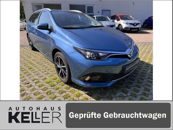 Denimblau metallic Gebraucht 2017 Toyota Auris Hybrid Basis Kombi | 16.460 € (Fairer Preis) - Bild 1/4