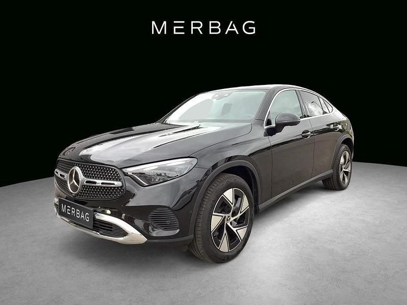Metalliclack obsidianschwarz Gebraucht 2024 Mercedes GLC300e Coupé | 66.900 € - Bild 1/4
