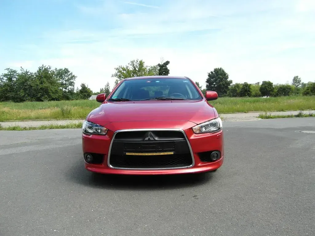 Gebraucht Mitsubishi Lancer Sportback 117 PS (86 kW) 2012 Rot Limousine