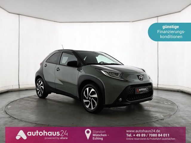 Grün Gebraucht 2024 Toyota Aygo Pulse Kleinwagen | 16.970 € (Etwas zu teuer) - Bild 1/4