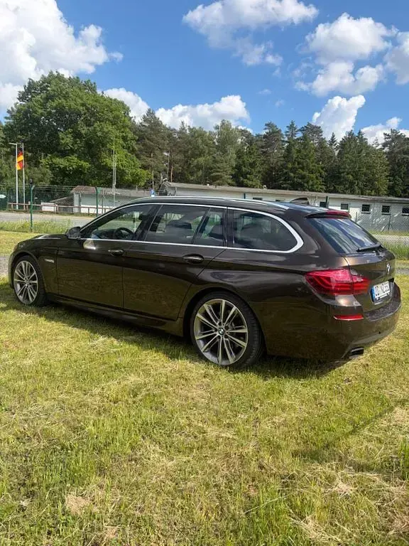 Gebraucht BMW M550 Performance 381 PS (280 kW) 2013 Braun Limousine
