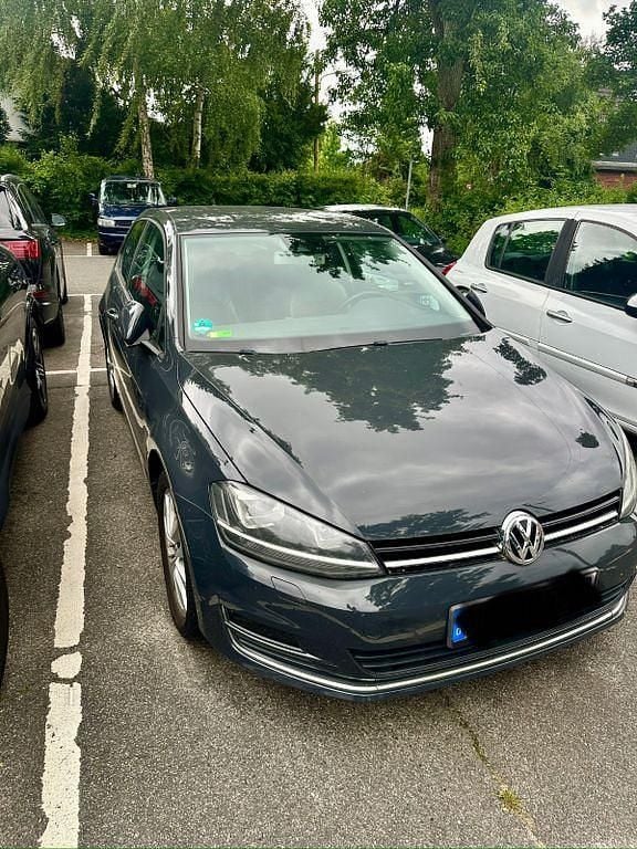 Grau Gebraucht 2013 VW Golf VII Comfortline Limousine | 11.800 € (Fairer Preis) - Bild 1/2