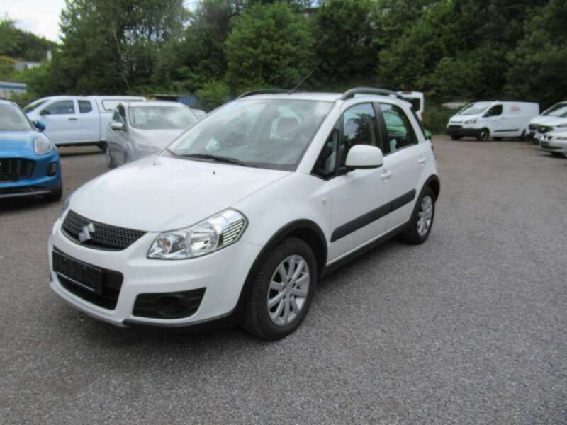 Weiß Gebraucht 2014 Suzuki SX4 Comfort Limousine | 8.500 € (Fairer Preis) - Bild 1/4