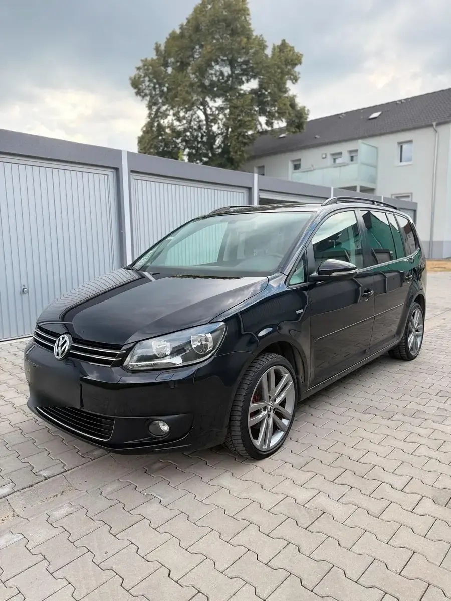 Gebraucht VW Touran 105 PS (77 kW) 2013 Schwarz Van / Kleinbus