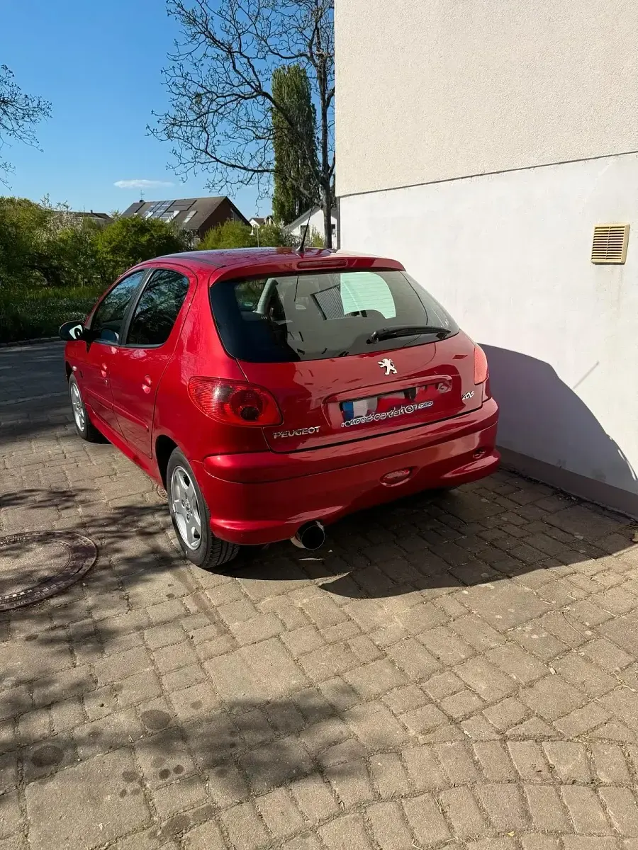 Używany Peugeot 206 75 KM (55 kW) 2007 Czerwony Hatchback