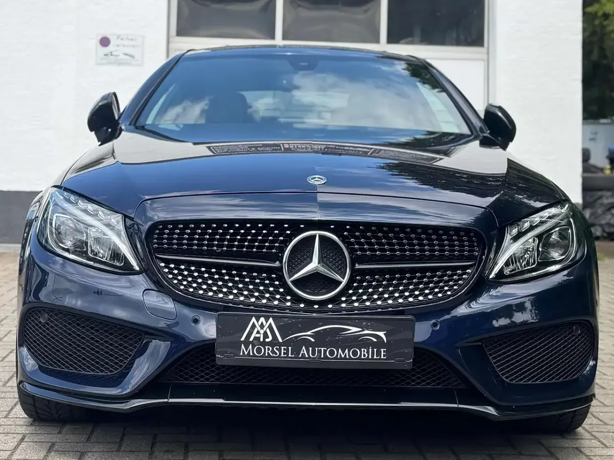 Gebraucht Mercedes C180 AMG 156 PS (114 kW) 2017 Cavansitblau  metalliclack Coupé
