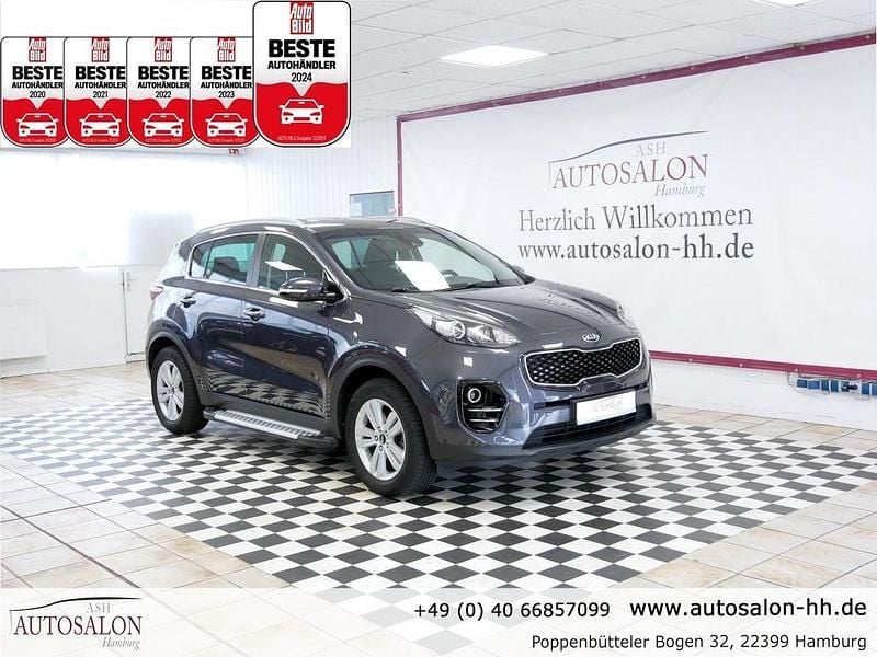 Winchestergrau met. Gebraucht 2018 Kia Sportage DREAM-TEAM Edition SUV | 15.799 € (Fairer Preis) - Bild 1/4