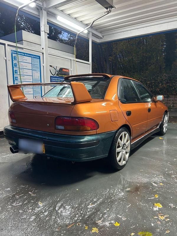 Gebraucht Subaru Impreza GT 125 PS (91 kW) 1996 Orange Limousine
