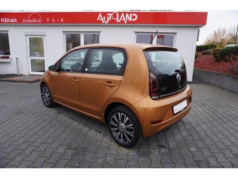 Gebraucht VW up! 90 PS (66 kW) 2018 Honey yellow metallic (metallic) Kleinwagen