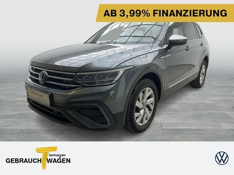 Platinum grey metallic Gebraucht 2021 VW Tiguan Allspace Pro SUV | 25.460 € (Superpreis) - Bild 1/4