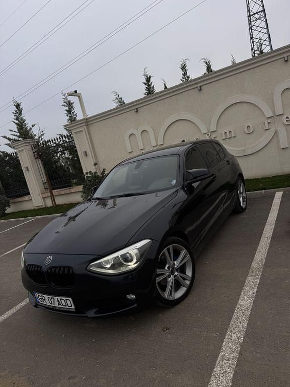 Schwarz Gebraucht 2013 BMW 118 Sport Line Kleinwagen | 8.700 € - Bild 1/4