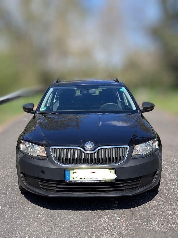 Grau Gebraucht 2014 Skoda Octavia Elegance Kombi | 4.600 € - Bild 1/4