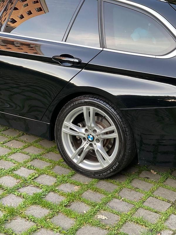 Gebraucht BMW 320 Sport Line 184 PS (135 kW) 2012 Schwarz Kombi