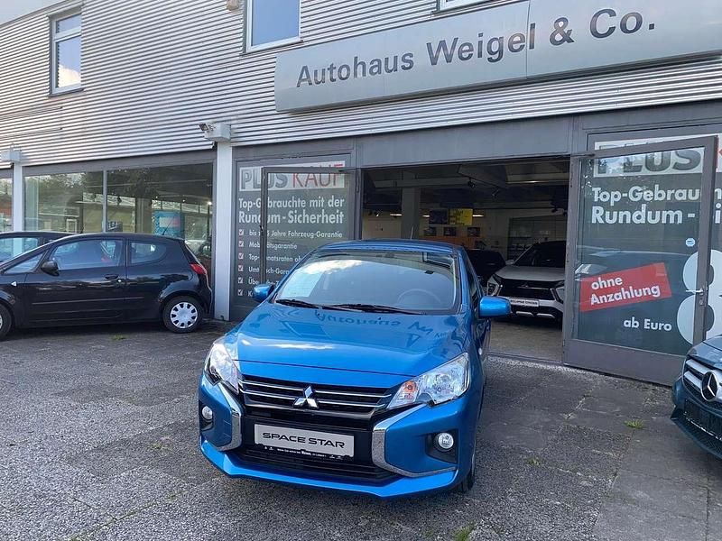 T69, atoll blau Gebraucht 2024 Mitsubishi Space Star Basis Kleinwagen | 11.440 € (Guter Preis) - Bild 1/4