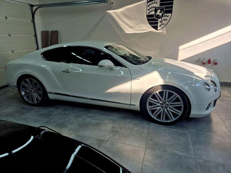 Weiß Gebraucht 2013 Bentley Continental GT | 54.692 € - Bild 1/4