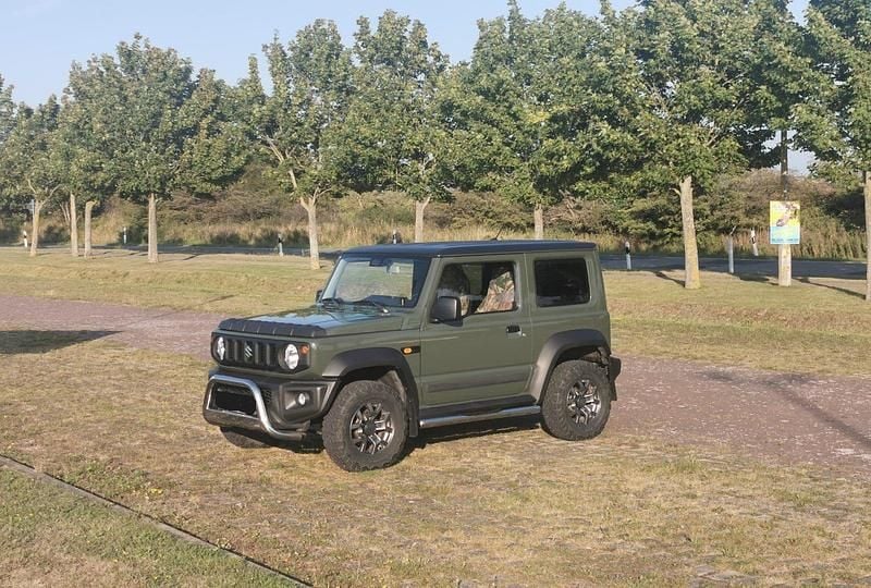 Grün Gebraucht 2019 Suzuki Jimny SUV | 28.500 € (Fairer Preis) - Bild 1/4