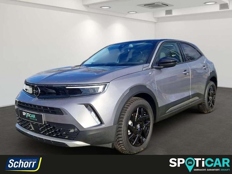 Gebraucht Opel Mokka-e Elegance 100 kW (136 PS) 2023 Kontrast grau (metallic) SUV