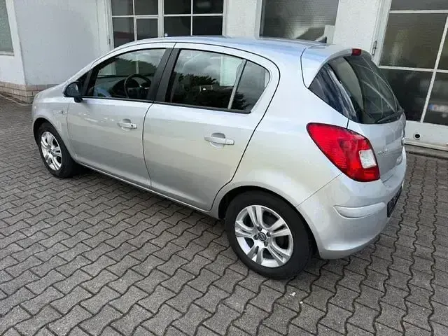 Gebraucht Opel Corsa Active 90 PS (66 kW) 2013 Silber Kleinwagen